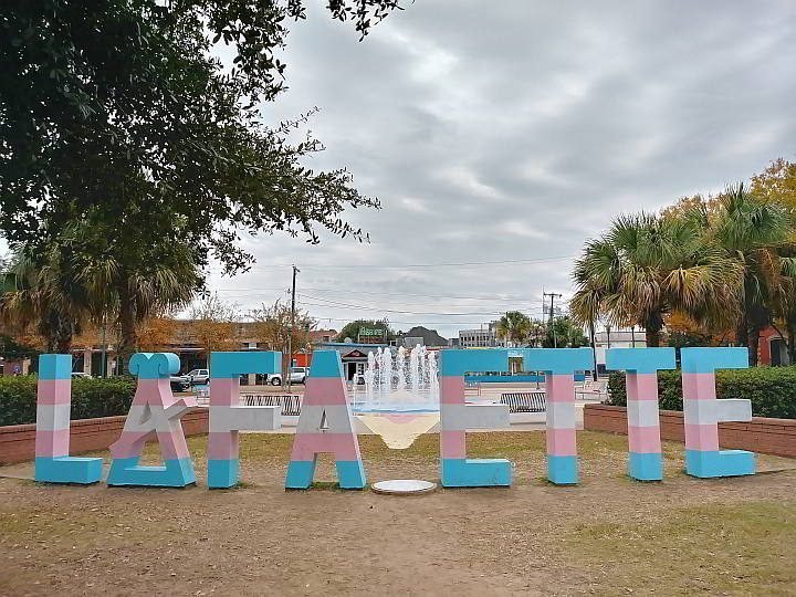 Giant letters spell LAFF ETTE so you can stand in for the Y in downtown Lafayette LA
