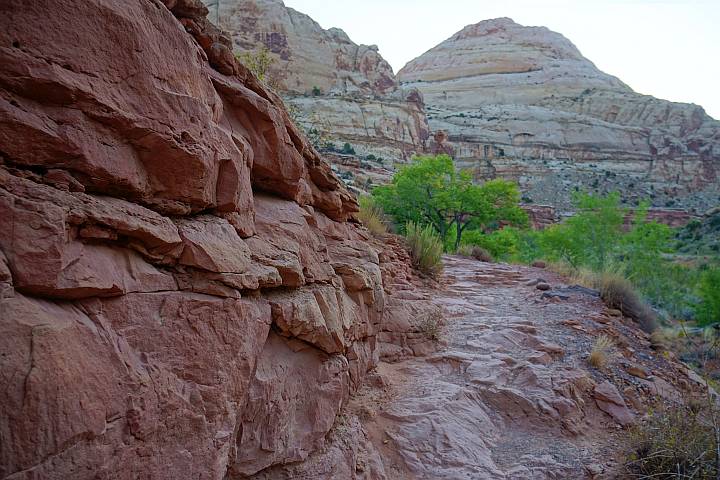 Beginning of the hike at Hickman Bridge Trail Canyonlands park features rocky terrain