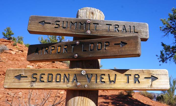 Sedona Arizona hiking trail signs at an intersection on Sedona View Trail