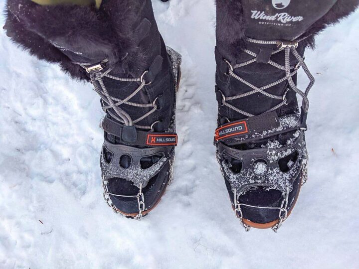 Insulated waterproof hiking boots with crampons.