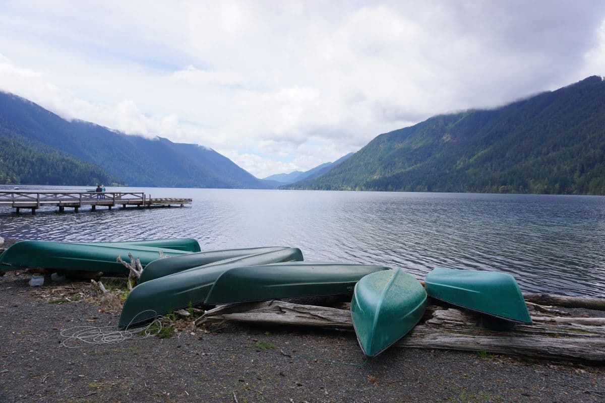 Canoes at Lake Crescent on a cloudy day in Olympic National Park.
