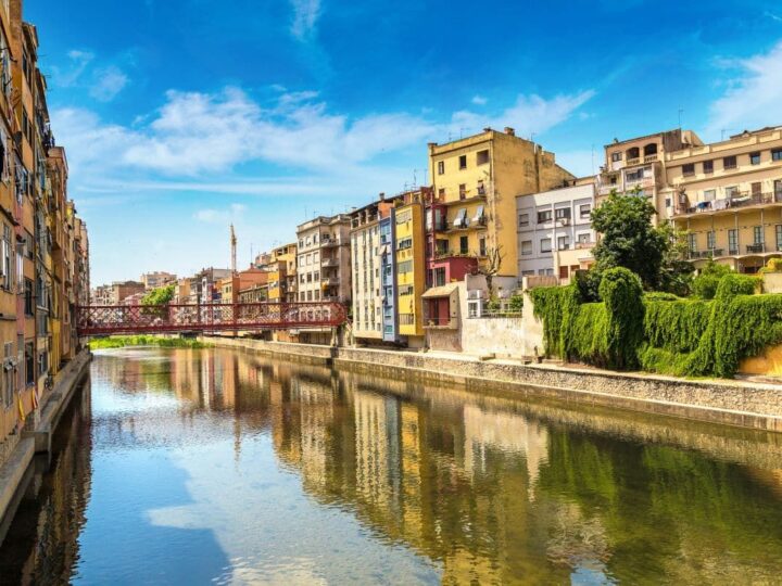 Colorful houses along the river in Girona Spain.