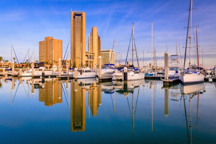 Corpus Christi Texas skyline reflected with a mirror image on the bay.