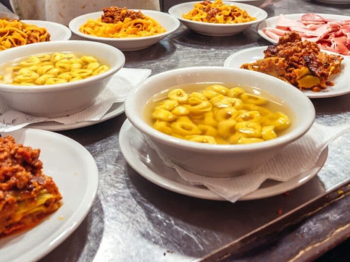 Various plates of food to eat in Bologna Italy.