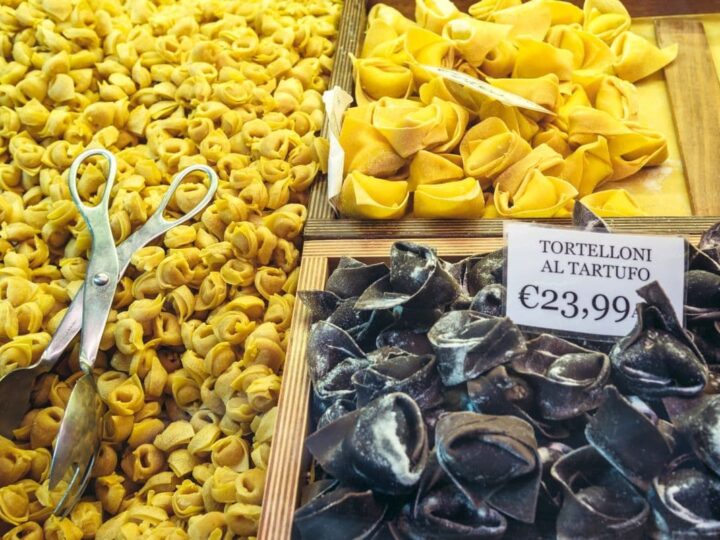 Tortelloni and Tortelloni al Tartufo display at market in Bologna Italy.