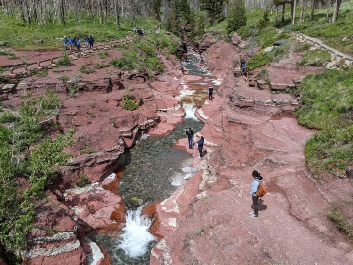 Hikers at Red Rock Canyon in Waterton Lakes National Park.