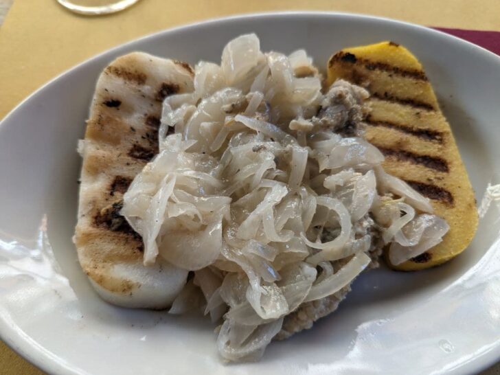 Sarde in saor with fried polenta.