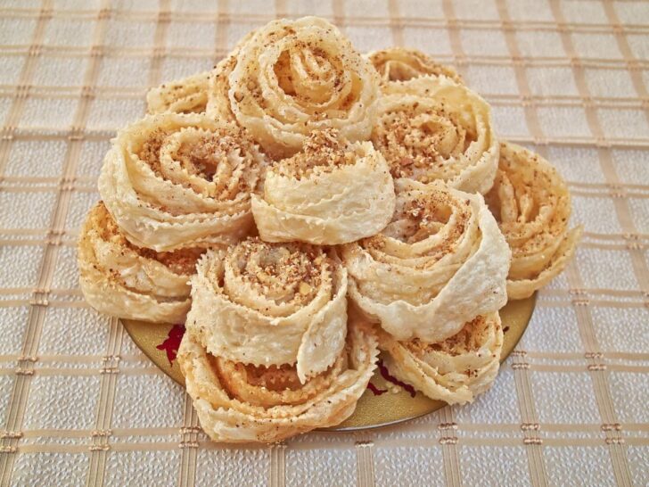 Xerotigana Greek dessert piled on a plate.