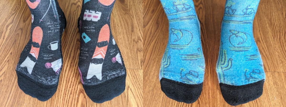 Smartwool hiking socks with skiing motif and with cactus and fish motif.