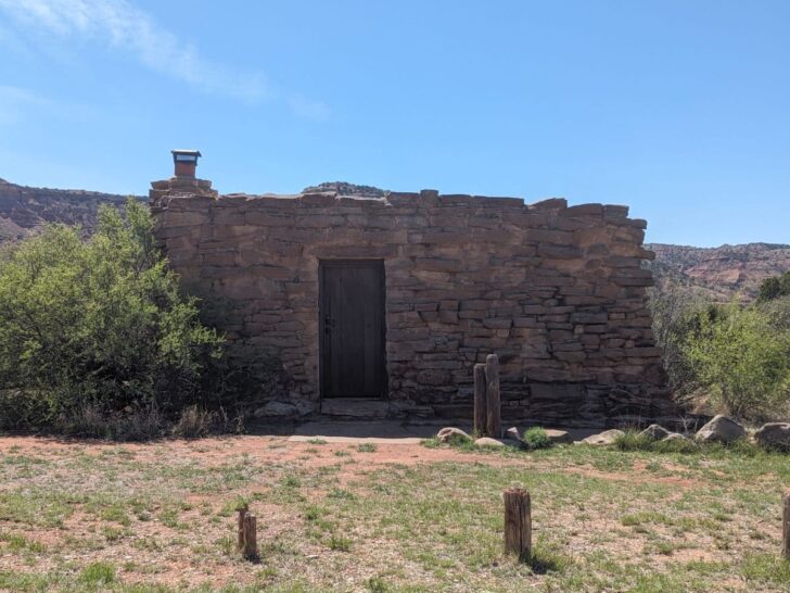 Small, stone cabin known as Cow Camp Cabin, at Palo Duro.