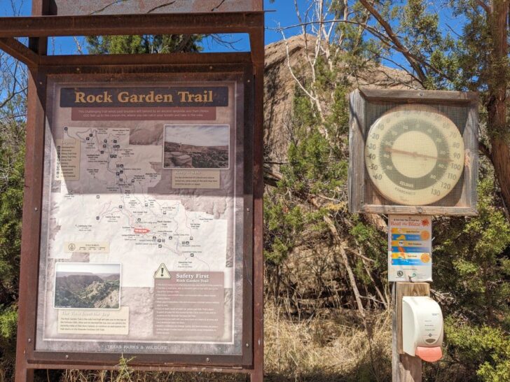 Rock Garden trailhead map, info, and thermometer with reading of 97 degrees F, in Palo Duro Canyon State Park.