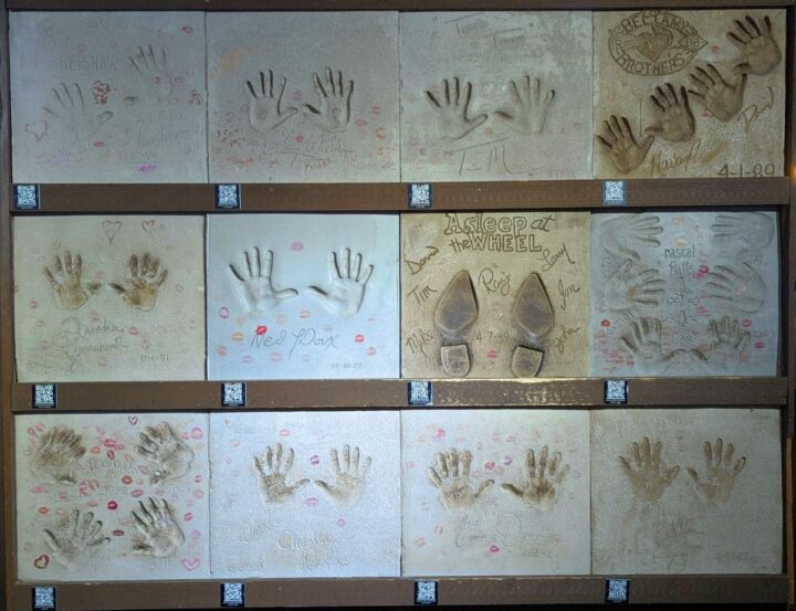 Handprints and one set of boot prints of musicians who performed at Billy Bob's Texas.