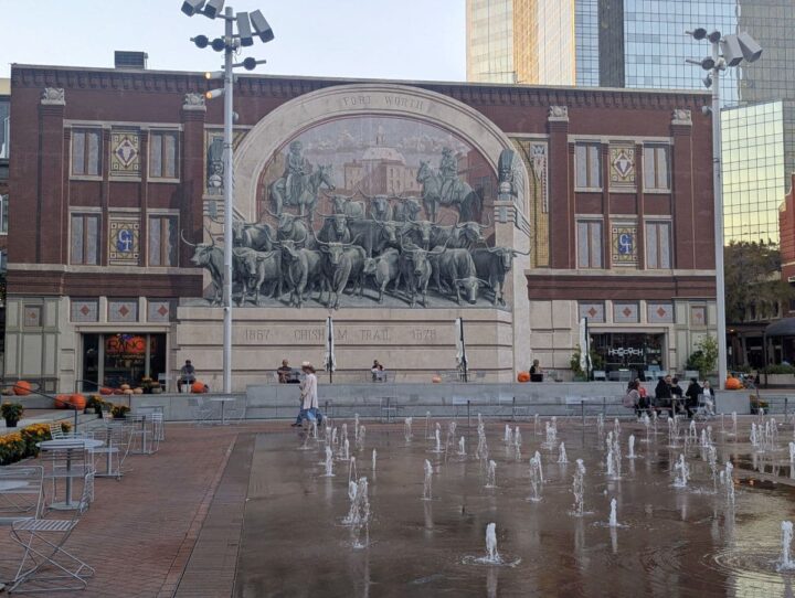 Chisolm Trail mural and water fountains at Sundance Square Plaza Fort Worth TX.