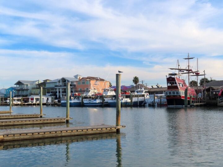 Port Aransas Municipal Harbor with fishing boats and the Red Dragon pirate boat.
